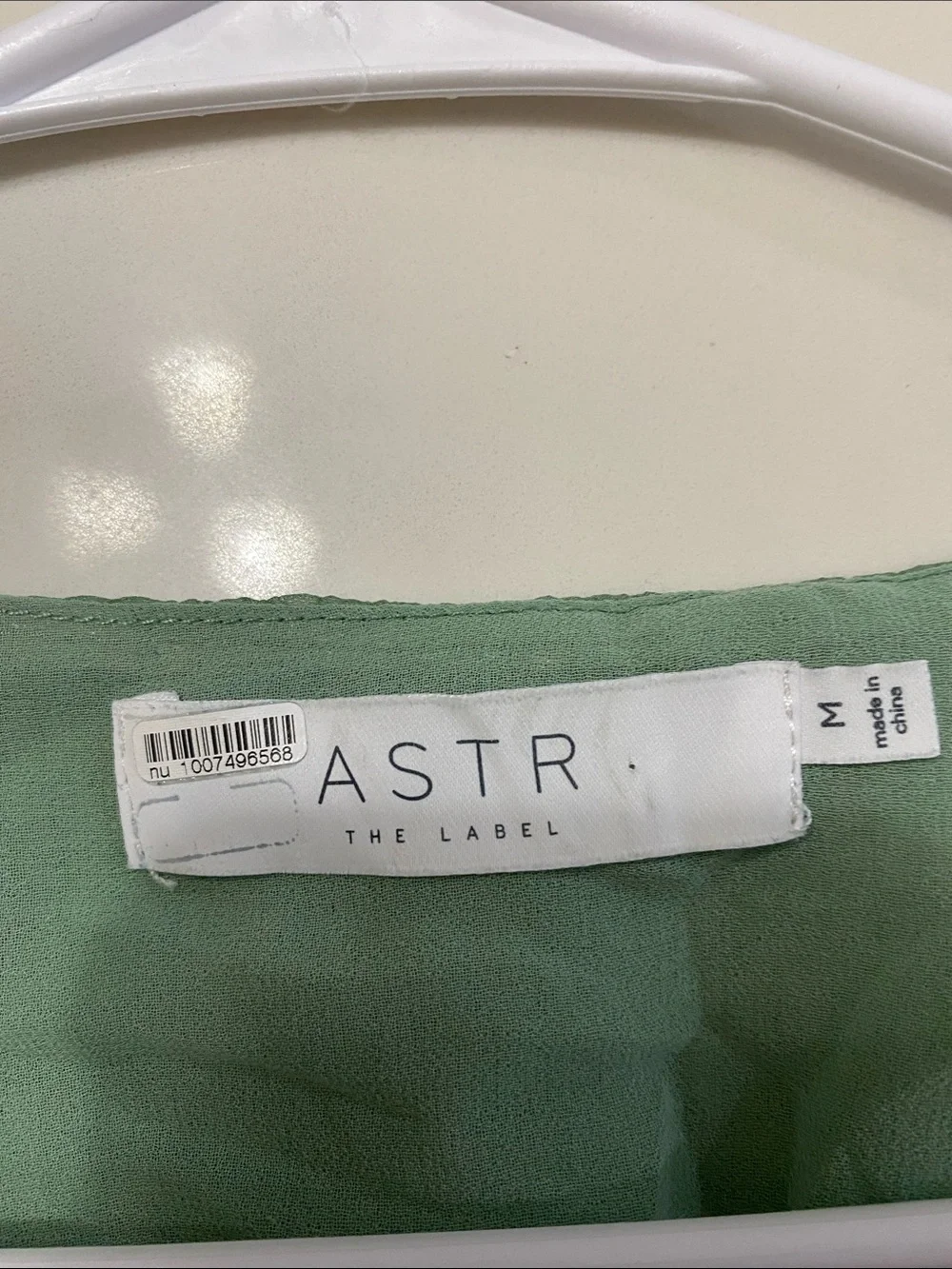 Astr Sage Green Smocked V-Neck Peplum Blouse